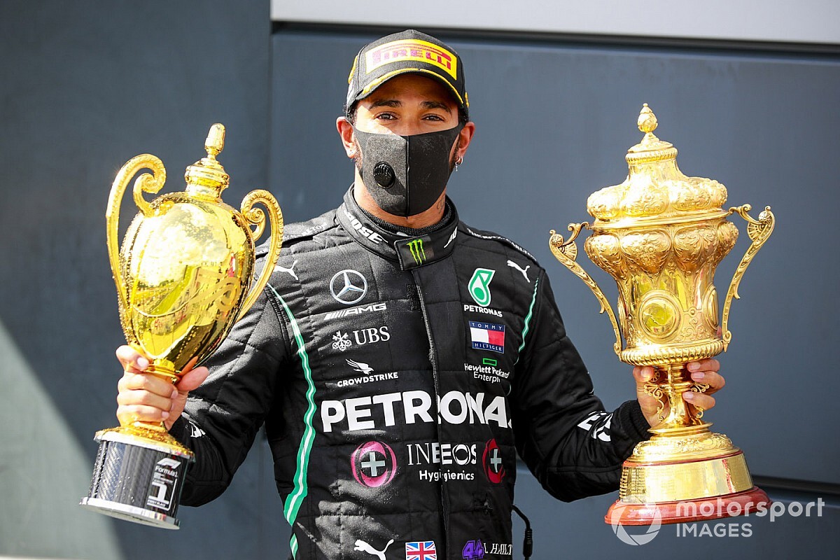 熊猫体育全站-F1英国站-雨水侵扰诺里斯乱战夺冠霍肯伯格首登领奖台